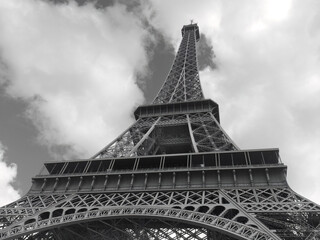 Eiffel Tower with white clouds in black and white
