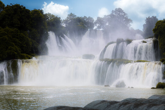 Gorgeous Detian falls or Ban Gioc falls between China and Vietnam. The waterfalls increase the quality of life for people who live within the sound of the falls. Horizontal image with copy space