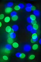 Golden and multicolored bokeh circle background for Christmas and happy new year with space to display messages