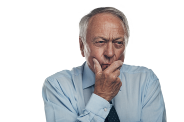 PNG shot of a senior businessman standing alone against a grey background in the studio and looking contemplative