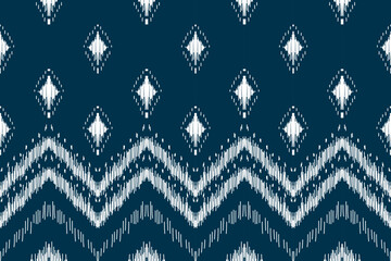 Ethnic ikat seamless pattern in tribal. Aztec geometric ethnic ornament print. Ikat pattern style. Design for background, wallpaper, illustration, fabric, clothing, carpet, textile, batik, embroidery.