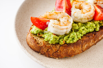 delicious Italian bruschetta with shrimps on a white background