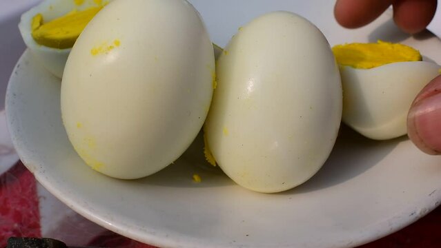 Boiled eggs are placed in the dish. Eating boiled eggs is good for health.