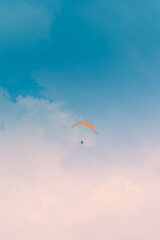 Motor Paraglider flying over sky of Ho Chi Minh City, Vietnam during New Year Festival and National Day