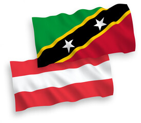 Flags of Austria and Federation of Saint Christopher and Nevis on a white background