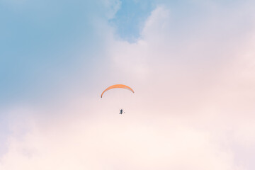 Motor Paraglider flying over sky of Ho Chi Minh City, Vietnam during New Year Festival and National Day