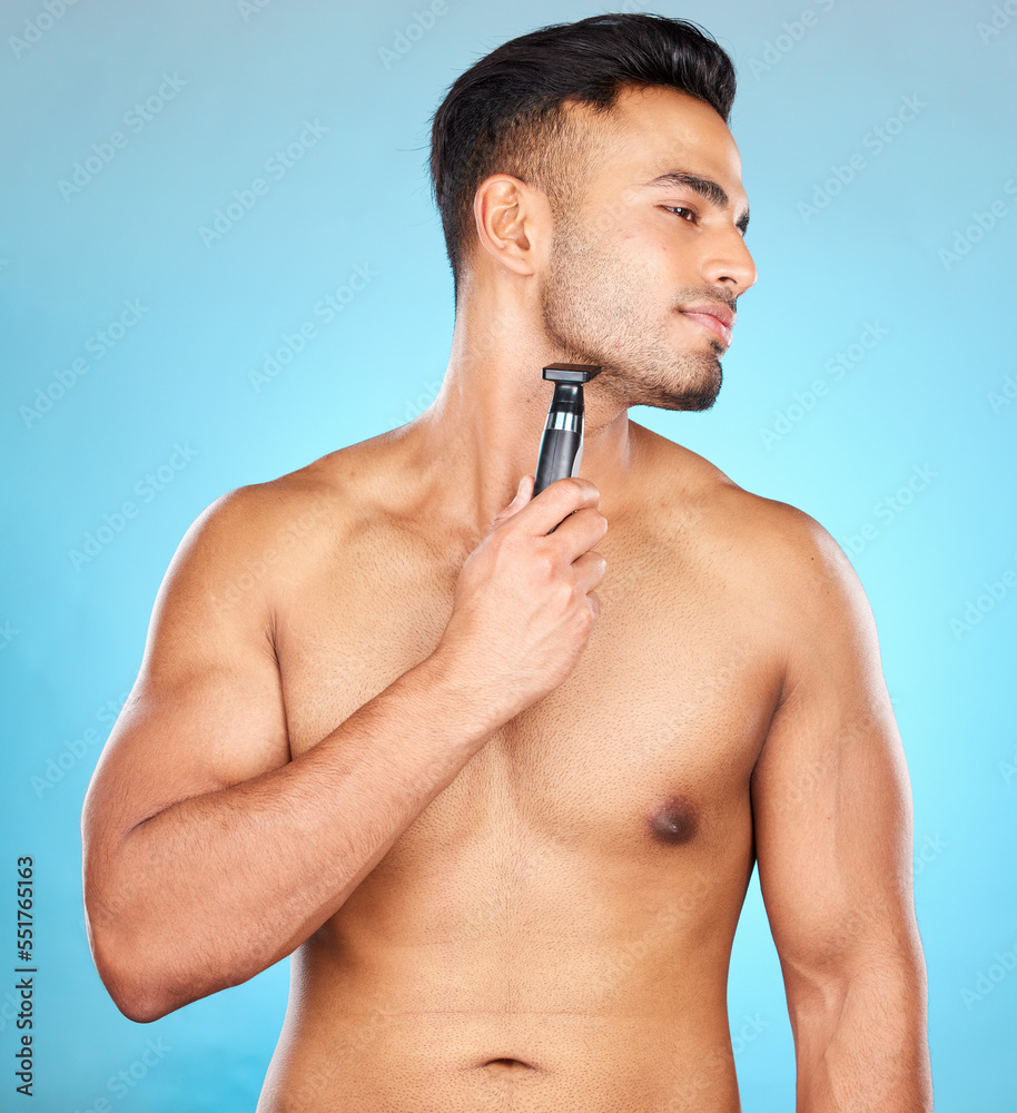 Sticker Studio, hair removal or model shaving beard or grooming his face for beauty or facial skincare wellness. Relaxing, blue background or healthy man cleaning his face with electric blade machine