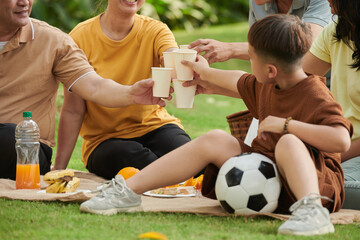 Family Toasting with Paper Cups