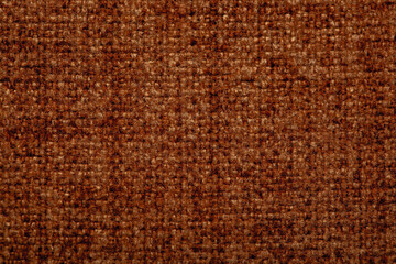 Close-up fabric swatches as a background. The texture of the material with patterns of weaving close-up. Upholstery fabric for interior decoration.