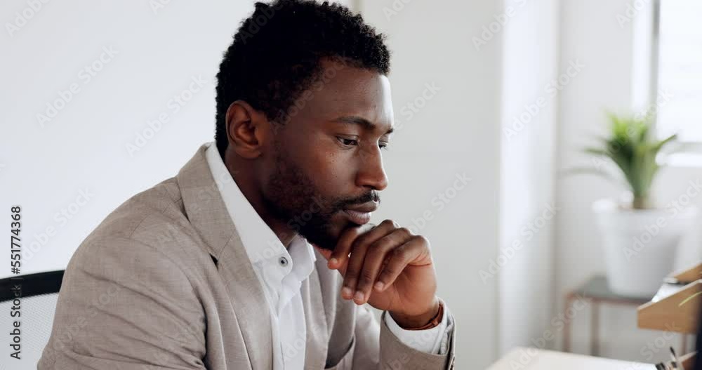 Poster writing, computer and thinking with a business black man at work in his office by a desk for growth 