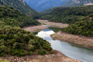 River and Mountain Landscape Nature Background. Sardinia, Italy.