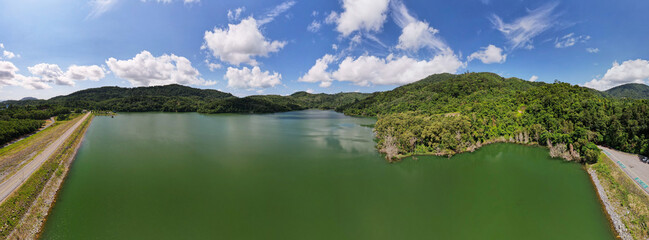 Aerial Drone shot bird eye view rainforest and road around the dam lake,Panorama landscape nature view, Amazing landscape High angle view