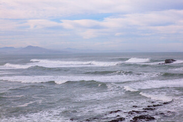 waves crashing on rocks