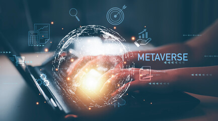 Metaverse with business concept, man using computer and touch virtual globe with financial icons...