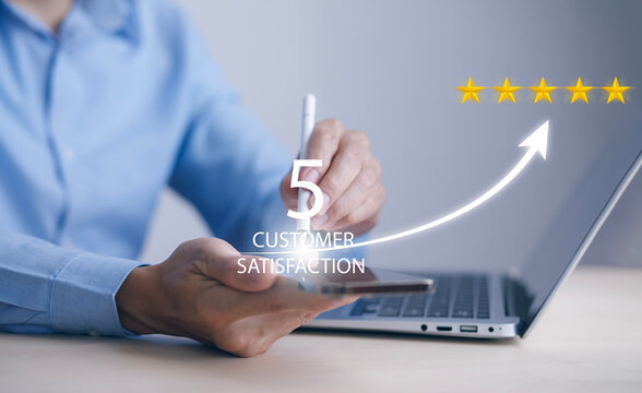 Man Touch Smartphone With Customer Review Satisfaction Feedback Survey Concept, User Give Rating To Service Experience On Online Application, Service Leading To Reputation Ranking Of Business.