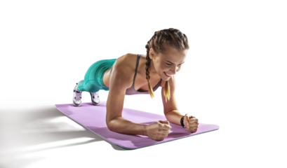 Beautiful woman at the gym doing fitness exercises. Sports transparent background.	