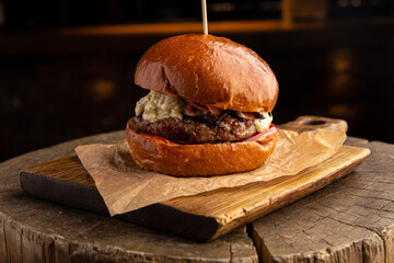 burger with beef, bacon and cheese