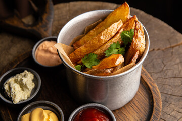 Rustic potatoes with a set of sauces