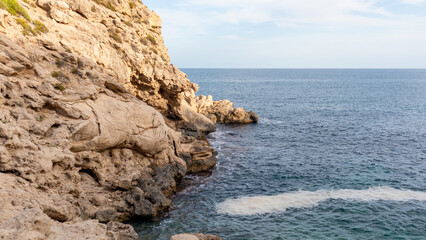 Beaches, cliffs and tourist places in the south of Spain. White coast in the Valencian Community.