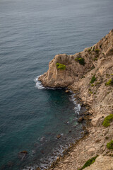 Fototapeta na wymiar Beaches, cliffs and tourist places in the south of Spain. White coast in the Valencian Community.
