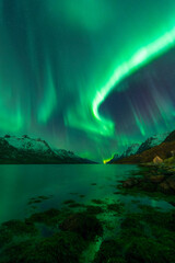 Fototapeta na wymiar Northern lights in Ersfjorden, Norway