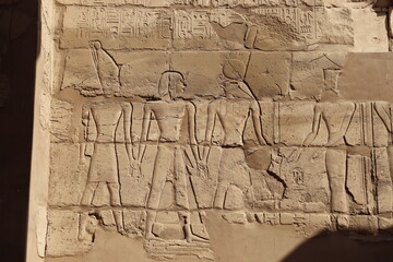 wall carvings at Karnak temple in Luxor, Egypt