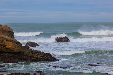 waves breaking on the rocks