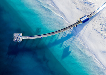 Jurien Bay Jetty morning sunrise shadows with people fishing
