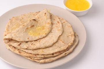 jowar bhakri with ghee butter, jowar is a grain popular in Maharashtra, Gujarat and Rajasthan
