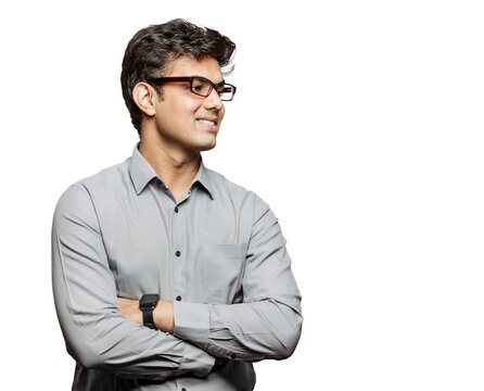 PNG image of an attractive bossy young businessman with crossed arms, friendly smiling looking at colleagues wearing specs isolated transparent background.
