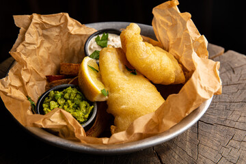 fish and chips with sauce, rustic potatoes with pesto