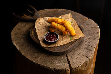 Cheese sticks with lingonberry sauce