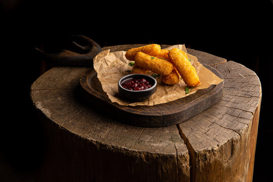 Cheese sticks with lingonberry sauce