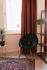 Elegant stylish lounge chair, carpet, shelf. Modern aesthetic minimalist home living room interior design. Luxury apartment interior