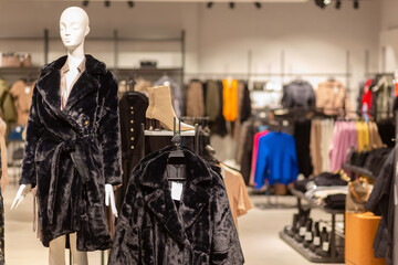 Fototapeta premium Interior of brand new fashion clothes store.