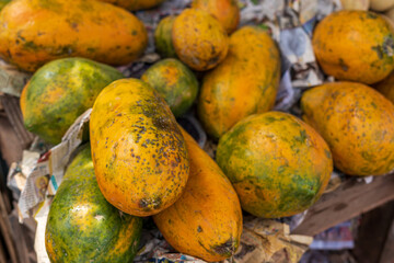 Papaya stand on the market - papaya fruit