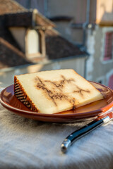 Collection of world cheeses, matured Spanish Sheep Cheese  with Black Garlic