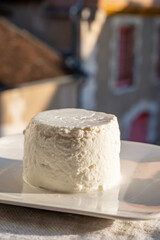 French soft white goat cheese served outdoor in sunlights