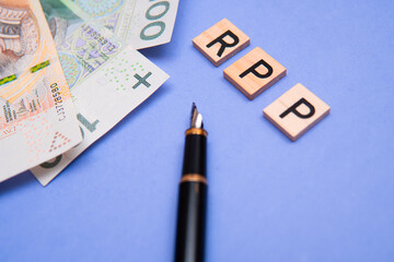 inscription RPP next to Polish money. RPP is Rada Polityki Pieniężnej. Interest rates and inflation fight in poland - obrazy, fototapety, plakaty