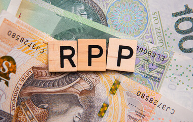 inscription RPP next to Polish money. RPP is Rada Polityki Pieniężnej. Interest rates and inflation fight in poland - obrazy, fototapety, plakaty