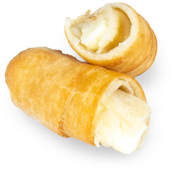 Tequeños or tequenos cut in halves, Venezuela appetizer from dough with melted cheese inside.