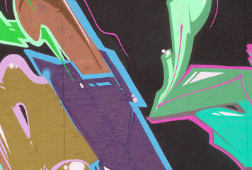 Colorful background of graffiti painting artwork with bright aerosol strips on metal wall. Old...