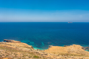 Crystal clear turquoise water down the Dingli Cliffs,  Malta