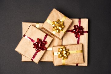 Christmas gift boxes with ribbons and paper decorations