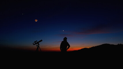 Fototapeta na wymiar Man with astronomy telescope looking at the night sky, stars, planets, Moon and shooting stars.