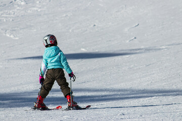 Fototapeta na wymiar Little skier. Theme of winter sports. Shahdag Resort - Azerbaijan.
