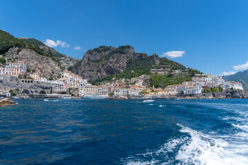 Fototapeta na wymiar View of the Amalfi coast from a boat, on a sunny day
