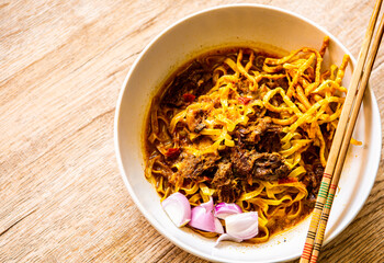 Northern Thai Curry Noodles with Beef or  Khao Soi, Thai famous food.