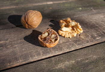 Walnuts over wooden picnic table