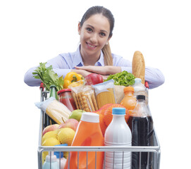 PNG file no background Smiling woman posing with a shopping cart - obrazy, fototapety, plakaty